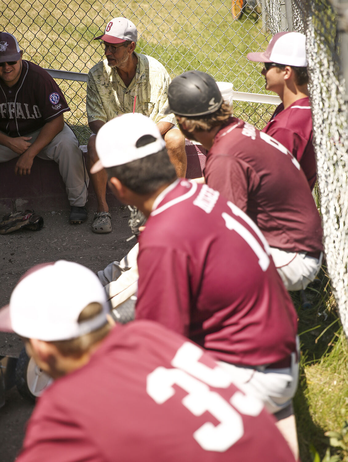 Head coach Wade Wagner talks to his team between games